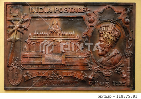 Celebrate silver jubilee of coronation of King George V(1935) British Government issued stamp depicting Sri Sital Nath Jain Temple, Street bass relief on the wall of Jain Temple (also called 118575593