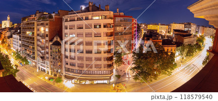 Panoramic view from rooftop to Girona city avenue at dusk with cathedral, Spain 118579540