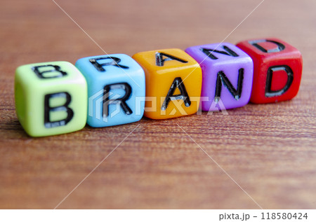 Close up of Brand text on wooden table. Close up of Brand text on wooden table. 118580424