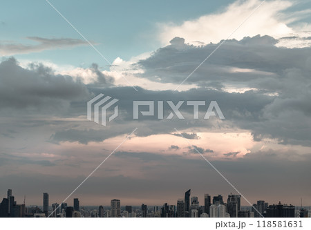 Aerial view of skyscrapers and dramatic sky before sunset. Aerial view of skyscrapers and dramatic sky before sunset. 118581631