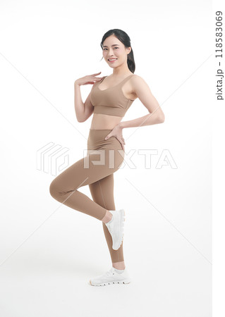 Beautiful young asian sport woman with sportswear ready for exercise on white background, Advertising sportswear and yoga wear, Healthy lifestyle, sport. 118583069