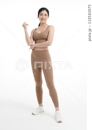 Beautiful young asian sport woman with sportswear ready for exercise on white background, Advertising sportswear and yoga wear, Healthy lifestyle, sport. Beautiful young asian sport woman with sportswear ready for exercise on white background, Advertising sportswear and yoga wear, Healthy lifestyle, sport. 118583075