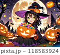 ハロウィンのカボチャに詰めたお菓子に笑顔の魔女 118583924