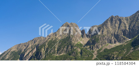 Rocky Mountain Peak Under Clear Blue Sky 118584304
