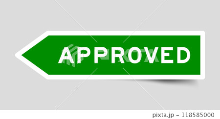 Green color arrow shape sticker label with word approved on gray background Green color arrow shape sticker label with word approved on gray background 118585000