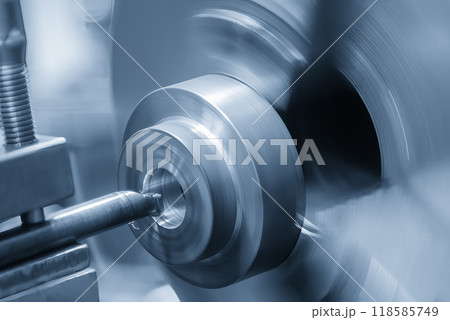 The CNC lathe machine boring cut process the cast iron parts. 118585749