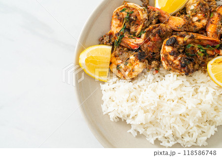 jerk shrimps or grilled shrimps in Jamaica style with rice 118586748