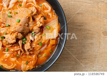 Korean udon ramen noodles with pork in kimchi soup Korean udon ramen noodles with pork in kimchi soup 118586749