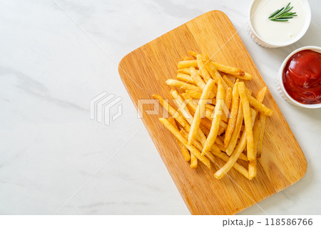 French fries with sour cream and ketchup French fries with sour cream and ketchup 118586766