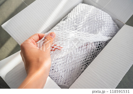Corrugated white paper for safe transportation, in which the goods brought by the courier delivery service are wrapped, environmental packaging concept 118591531