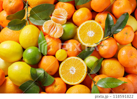 Fresh citrus fruits as background, top view 118591822