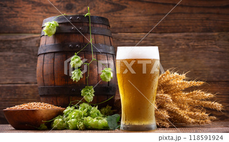 glass of beer, wheat ears, green hops and beer barrel 118591924