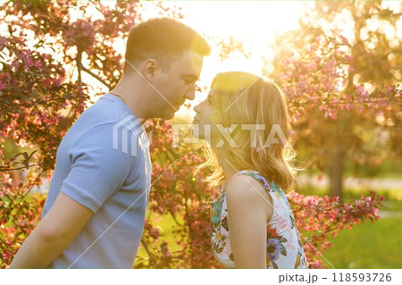 Couple girl and guy standing at sunset 118593726