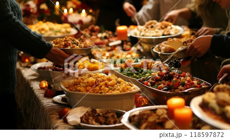 A Festive Buffet Spread with People Serving Themselves 118597872