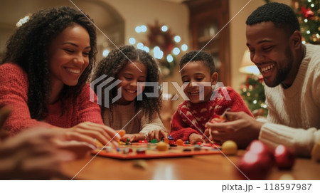 Family playing board game during Christmas celebration 118597987
