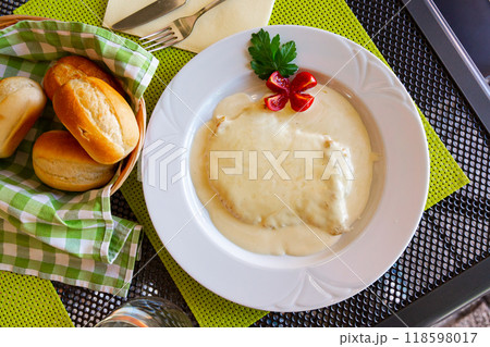 Tasty poultry fillet with creamy sauce 118598017