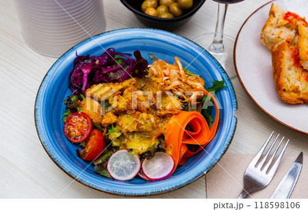 Cesar style salad with antique mustard vinaigrette 118598106
