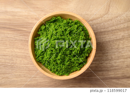 Wolffia or water meal in bowl, Edible small aquatic plant high protein, Table top view 118599017
