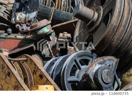 Old tractor parts, Rusty ndustrial machinery and other used at second hand parts car shop. 118600735