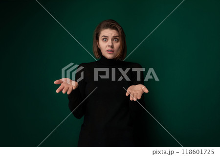 Woman in Black Sweater Holding Out Hands 118601725