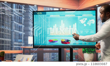 Elderly couple discussing about retirement plans with a financial planner, covering savings strategy and pension options. Middle aged people looking to invest to secure their budget. Camera A. 118603087