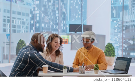 During an office tour, business woman negotiating contract terms and reaching an agreement with the realtor financier. Entrepreneur looking to develop a professional workspace. Camera B. 118604112