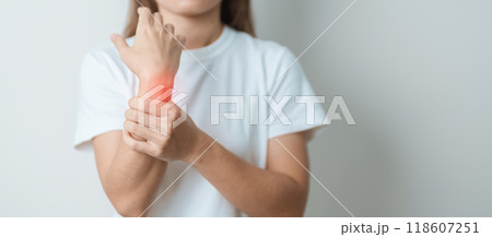Woman having wrist pain at home, muscle ache due to De Quervain s tenosynovitis, ergonomic, Carpal Tunnel Syndrome or Office syndrome and Parkinson disease concept Woman having wrist pain at home, muscle ache due to De Quervain s tenosynovitis, ergonomic, Carpal Tunnel Syndrome or Office syndrome and Parkinson disease concept 118607251