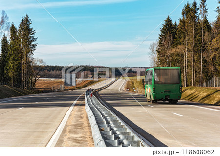 Belarus, Minsk - 24.03.2017: On the road there is a passenger bus Belarus, Minsk - 24.03.2017: On the road there is a passenger bus 118608062