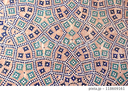Vertical or horizontal background with detail of ancient mosaic walls with clay details and geometric ceramic tile ornament. Traditional iranian tile decorations 118609161