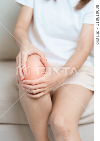 woman having knee ache and muscle pain due to Runners Knee or Patellofemoral Pain Syndrome, osteoarthritis, arthritis, rheumatism and Patellar Tendinitis. medical concept 118610008