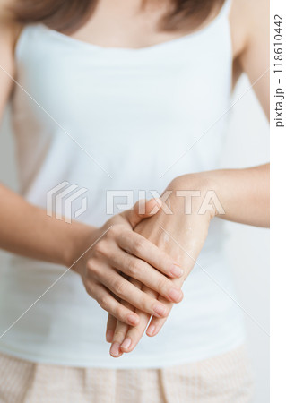 Skin care lotion and Skin body cream Moisturizing, Sunscreen and Healthy Daily Routine concepts. Beauty Woman applying moisturizing skincare cream on hand and body at home 118610442