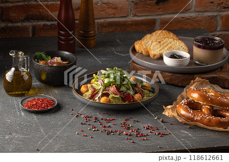 Table served with dishes of beef brisket salad Table served with dishes of beef brisket salad 118612661