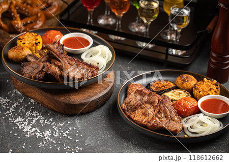 Portion of grilled meat with vegetables  118612662