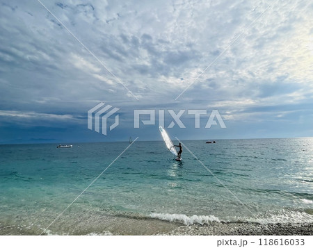 Rocky beach and crystal turquoise water of Ionian Sea in Albania. Rocky beach and crystal turquoise water of Ionian Sea in Albania. 118616033