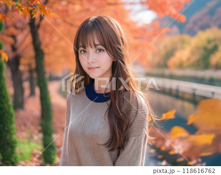 秋の紅葉の風景と笑顔の若い女性 118616762