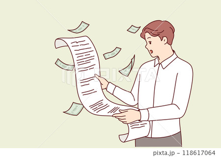 Tax burden and bill from federal government shocks man, reading letter from tax inspector 118617064