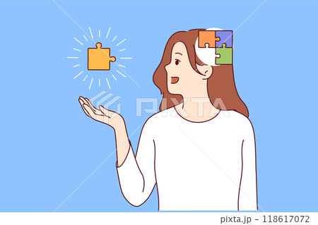 Process of self-discovery in girl with puzzle in head and hands, exploring own thoughts and behavior 118617072