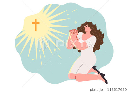 Christian woman prays to god on knees, near glowing catholic crucifix symbolizing faith in jesus Christian woman prays to god on knees, near glowing catholic crucifix symbolizing faith in jesus 118617620