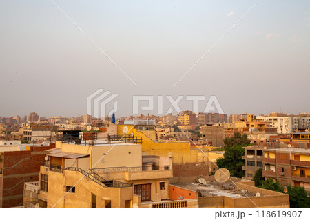 view of the roofs of houses at sunset Giza, Cairo Egypt view of the roofs of houses at sunset Giza, Cairo Egypt 118619907