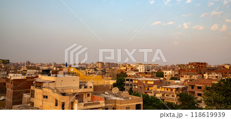 view of the roofs of houses at sunset Giza, Cairo Egypt view of the roofs of houses at sunset Giza, Cairo Egypt 118619939