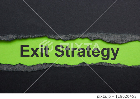 Torn paper with the words exit strategy. Represents business closure. Torn paper with the words exit strategy. Represents business closure. 118620455