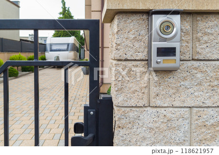 Gated driveway with video intercom system and caravan parked Gated driveway with video intercom system and caravan parked 118621957