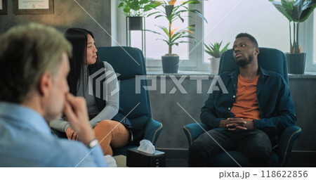 Multiethnic couple on couples therapy with psychologist 118622856