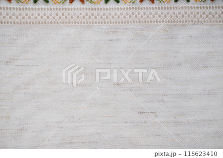 Natural Linen Fabric with Delicate Crochet Trim and Floral Embroidery, Ideal for Traditional Crafts and Home Decor 118623410