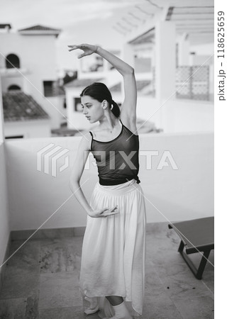 A Beautiful and Graceful Ballet Dance Pose Captured in Striking Black and White Photography 118625659