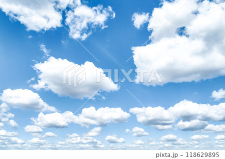 Beautiful blue sky and white cumulus clouds abstract background. Cloudscape background. Blue sky and fluffy white clouds on sunny days. Blue sky and daylight. World Ozone Day. Ozone layer. Summer sky. 118629895