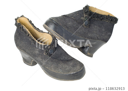 Old vintage traditional woman's shoes isolated with clipping path. Old vintage traditional woman's shoes isolated with clipping path. 118632913
