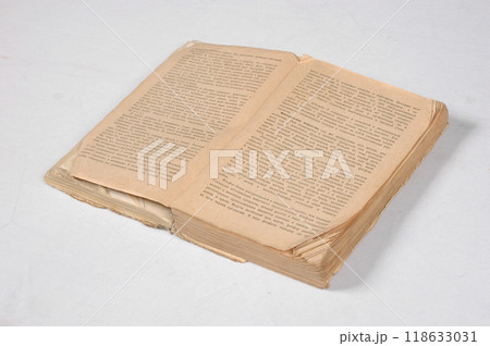 Old antique vintage open book on white Old antique vintage open book on white 118633031