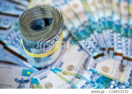 Thick wad of money cash on table 118633232