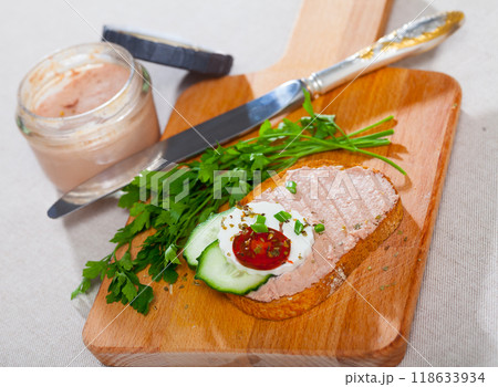Pate on toasted bread with fresh cheese on wooden board Pate on toasted bread with fresh cheese on wooden board 118633934